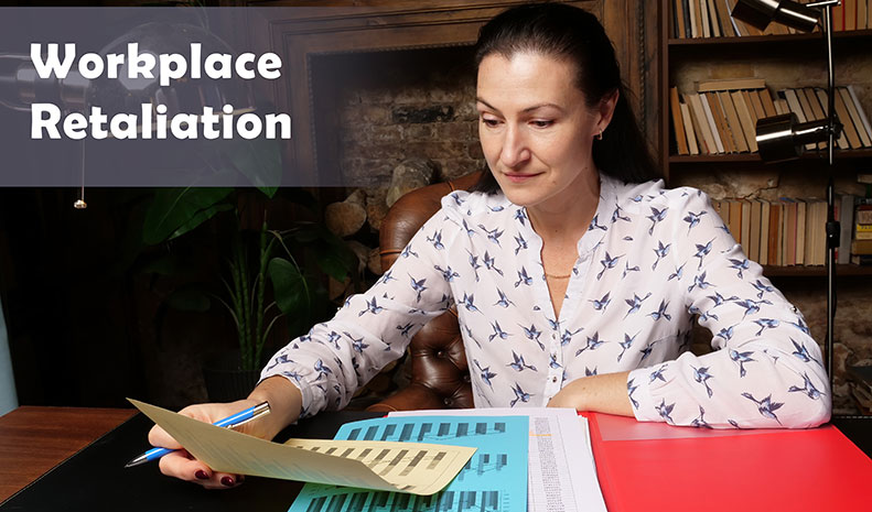 Female office workers with yellow shirt holding and writing documents on office desk
